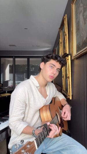 Alec Golinger Instagram - Love this tune ⭐️ 
*
*
*
#cover #singing #guitar #music #musician #peaceful #escape #relax #chill #vibes #reels #instareels #fun