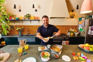 Alex Brooker Instagram - No this isn’t the release of the new Alex Brooker cook-book! I’ve partnered with @mccainukie and @family_fund to promote more inclusive social get-togethers for families raising a disabled or seriously ill child. 

Research has revealed that only 12% of families supported by Family Fund say they are able to take part in all the social activities they’d like to, causing 83% to feel sad, left out and frustrated.

As part of the campaign to promote more inclusive get-togethers, we gave away 2,500 limited-edition scoop bowls to families of disabled and seriously ill children to eat independently, wherever, and however, when having meals. #mccainbowl #McCain #FamilyFund #ad