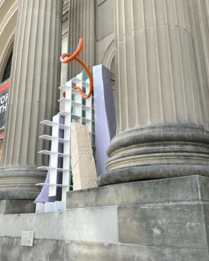 Alexandra Munroe Instagram - Congratulations to Nairy Baghramian for her Met Facade Commission, four rambunctious, whimsical and strangely emotional compositions that feel like they tumbled out of drawings for a utopian city that was never built. Hands down, the best use of the Facade so far. Roberta Smith’s review gets it right: “Their final lesson may be almost biblical- stone to stone, dust to dust - which is the illusory nature of all things, institutions included.” 

@metmuseum @nairybaghramian #metmuseum #thebest #newyork #robertasmithnyt @robertasmithnyt