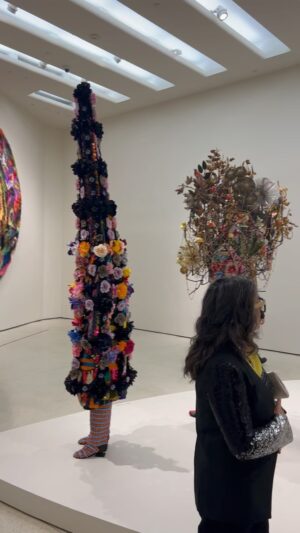 Alexandra Munroe Instagram - Congratulations to our Chief Curator Naomi Beckwith on her stupendous Nick Cave show at the Guggenheim. They lead us on an otherworldly journey, mystical yet gritty, enchanting yet dark, celebratory yet somehow terrifying too. Here, a Tower gallery installed with a crowd of sound suits, a procession heralding a new (dis)order. #mustsee

@guggenheim @nickcaveart #guggenheim #forothermore #vision