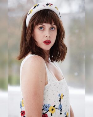 Alexandra Roach Instagram - Happy Friday! 
All dressed up and nowhere to go 💋 

📸 @_tanzaro 
👗  @aimeecroysdill & @ganni 
💇‍♀️ & 💄 @_caroline_menkes_mua