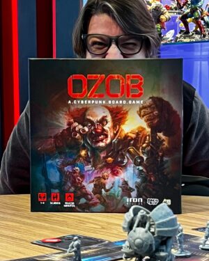 Alexandre Ottoni Instagram - Esse dia foi incrível! Vocês não têm noção de como eu estava feliz e orgulhoso de convidar a galera para testar pela primeira vez OZOB - A CYBERPUNK BOARD GAME!

Nosso primeiro jogo de tabuleiro, desenvolvido pelas mentes brilhantes de @jordyadann e @orenatosimoes, da Uaipiá Studios, e com arte, design gráfico e esculturas pela @ironstudios, que está chegando no segundo semestre.

(Os componentes ainda são protótipos, não é a versão final de fábrica)

Foi incrível ver todo mundo se divertindo de verdade, comemorando lances como se fosse um gol com gritos de alegria em uníssono. Que sensação gostosa de compartilhar com a galera o resultado de anos de trabalho de tanta gente talentosa e ver a alegria da galera enchendo o ambiente.

Obrigado a todos que estiveram lá para prestigiar esse  dia tão especial para um nerd que AMA jogos com todo coração! ❤️🤡💥
 
#ozob #boardgame #jovemnerd #cyberpunk