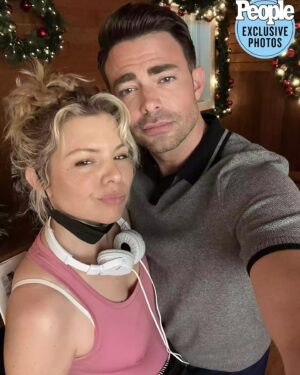 Ali Liebert Instagram - "On Christmas, we wear pink" 💅🏻 Thank you @people and @jonathandbennett! #TheHolidaySitter @hallmarkchannel