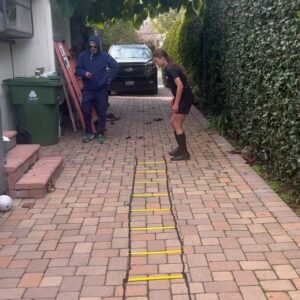 Alicia Coppola Instagram - Never even touches a rung.
#drivewaydrills with @gretajones2010 
I’m going to try this at @trainingmate.
And blow out my knee.