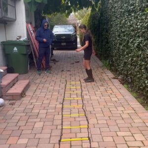 Alicia Coppola Instagram - Never even touches a rung.
#drivewaydrills with @gretajones2010 
I’m going to try this at @trainingmate.
And blow out my knee.