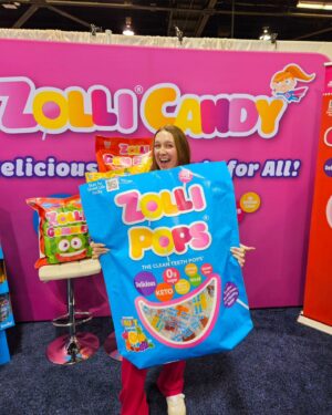 Alina Morse Instagram - Life-size Zolli Bags?!? Immediately yes. 

Expo west 2024 has been so amazing, so sad it's the last day 

#expowest2024 #expowest #zollismiles #zollicandy #zollipops #zupergirl #womenownedbusiness #femalefounders #sugarfree #keto #sugarfreecandy #travelvlog #tradeshow #diml