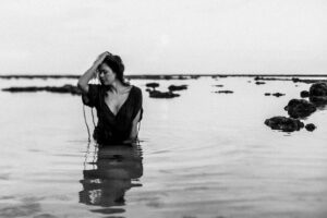 Aliyah O'Brien Instagram - Oh my goodness you guys!
I have endless photos of me in my ELEMENT (barefoot, beached, barely clothed) taken by my absolute favorite, most talented babe ever @kristineilana of @theportraitsessions 🥰

And because I’m still a little afraid at times of being “too much”, I’ve barely posted any 🙈

Good gawd!
No more of this!

I came across these photos and was like jeeezus why don’t I ever post these?!
I need to post these for Kristine because she’s so fucking good (seriously though we shoot for like 15 min. and she captures so much gold! Her super power is really seeing you and capturing that authenticity. Hire her, fly her out to you, it’s worth it!).

But really, I need to post these for me.
Because I’m no longer the girl who’s afraid to shine because she might get ousted by her grade school crew. 
I’m no longer the woman who’s afraid people won’t see past her physical appearance to her heart.
I’m no longer the part of me that thinks she isn’t valuable if she’s not attractive, or the part of me that judges that part for thinking that because she’s not evolved enough 🙃

I was never those parts, 
I just wasn’t aware at times of the deeper truth.

These parts of me may still  speak up from time to time, I may still forget, I may opt to play small…
But the big love energy that I truly am is becoming a more familiar resting place,
and that love has the space and compassion to see these parts, love on them hard, and then free them to shine 🌟

May we all find our way to the soft bed of our hearts, and from this juicy place, feel the courage to 
SHINE BABY SHINE✨💖✨

You are love 🫶
Love you 💋
