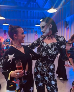 Allison Miller Instagram - @lizzy_greene found my dream pants in a vintage shop, took me to @betseyjohnson’s 80th birthday party, and captured the moment when @gottmik said she loved my makeup. ⚰️🪦👻🤌🏼RIP to my earthly form as I have ascended.