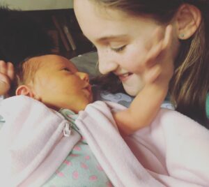 Amaryllis Fox Instagram - Magical hours and days these are.
.
Baby Bobby arrived safe and snug on January 7th at 6:27 pm. She’s named for her father, grandfather and great grandfather, carrying their legacy into a future where women stand shoulder to shoulder with their fathers, brothers, and sons to do the work of love in the world. May she hold in her heart their fathomless commitment to human dignity, peace among nations, and protection of our natural world.
.
During this pregnancy, Bobcat and I traveled many thousands of miles together, visiting distant corners of this beautiful earth, working with some of the world’s most poor and finding, again and again, human spirit so rich.
.
After that long journey, this littlest fur cub was born on the first day of epiphany, the season set aside by ancient christians to mark the realization that love vanquishes all. As I hold her softly breathing in my arms, surrounded by love in our warm den, that couldn’t feel more fitting.
.
Every day, we, each of us, experience the mysteries of life, of love, of family, of grace. May we revel in the vastness of the great beauty we share, strengthened to bridge the small details we do not. May we do right by one another, friends and strangers alike. Look after one another, protect one another, love one another the way we do our littlest ones. Because in the end, each of us is just a baby grown. Each of us, a caretaker in waiting. Destined to save and savor one another. United in a community I can only dream may one day be as filled to overflowing as our little bear pack feels tonight. 🐾❤️
