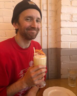 Amelia Meath Instagram - Here is my love, my best friend, my favorite person- holding a bunch of beverages and giving some sass. He was born today. I am so grateful- and also deeply in awe of him. Thank you for letting me live next to you. It is the honor of my life.