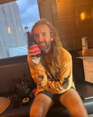 Amelia Meath Instagram - Here is my love, my best friend, my favorite person- holding a bunch of beverages and giving some sass. He was born today. I am so grateful- and also deeply in awe of him. Thank you for letting me live next to you. It is the honor of my life.