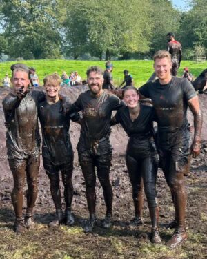 Amy James-Kelly Instagram - TOUGH MUDDER NORTH WEST 2023
••••
15km of mud, water, hills, and the wackiest obstacles since Richard Hammond and his Big Red Balls.
••••
Like Fall Guys, but real life, and you don't bounce if you fall. And you pay to do it. And you hurt for days after. And you run for way more than a couple of minutes. And there's no bright colours, it's all just grass and mud. So it's nothing like Fall Guys really. 
••••
I've been nervous about this for months - two surgeries later and I'm negotiating this event with a body that needs to do more than just train to run for a bit... There were obstacles I was on doctor's orders NOT to attempt (and I didn't, dw) But I conquered it. All 15k. And when I had to miss out an obstacle (like the two that electrocute you) I made sure I pelted it to the next one, just so no one could say I had an easy day of it 😜. We all crossed the finish line together, caked in mud, water, sheep shit, blood and sweat. And dya know what? I had a belting time. I have crap upper body strength so fell off every single set of monkey bars I crossed paths with (into the most horrible 'water'), but I did do two obstacles that triggered my claustrophobia so I'd say I redeemed myself...
••••
Matt, Will, Andy and of course Dan, who I absolutely not in a million years could have done this without, right from training to pulling me up the last few feet of that wall as I dangled from his arms. (And there's evidence within these photos that he had rather a nice time assisting me too, I guess... 😜)
••••
Can't wait to see the official photos from the event and be greeted by some ridiculous shots of me going arse over tit... @toughmudder