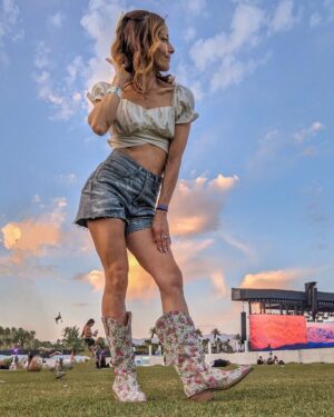 Amy Paffrath Instagram - A blond, a brunette & a redhead go to @coachella 🦋🌈🎡✨💖 no better festival duo than @lauren_koeppe   @pagejeter 
Day 1 was a dream 💭 and when my head finally hit the pillow after 8  hours of dancing, there was @honeymoon on her motorcycle giving us all compliments and encouraging me to write my book. Live like Lana. Be weird, dark and crazy. To thine own self be true and the people who your moody melodies are meant for will receive your artistic vision fully. Grateful to experience this iconic performance and be present for it. It's a beautiful life. Don't miss it 🫶🏻🎶

#coachella #dancinginthedesert #lanachella #iykyk