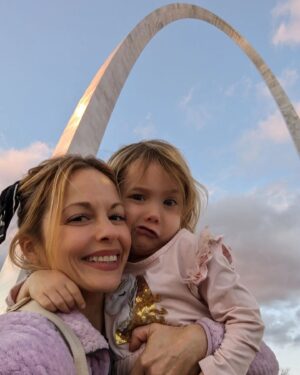 Amy Paffrath Instagram - Honoring my inner child by showing up for this precious soul. This was a very healing visit to my hometown. We tried to go up in the Arch but it was sold out. So instead we walked to the Old Cathedral and lit a candle for Flo, her namesake who died 3 years ago today. The synergies are everywhere and I know that miraculous healing I prayed for on the way here has happened. I feel lighter. Eternally grateful for the city that shaped me and this beautiful symbol of hope and possibly. It's the gateway to the West and I guess I took that literally, moving as far West as one could go. California is my home now but you can never forget your roots. We travel home today with full hearts from the quality time spent with my Mom, Aunt, Uncle, sisters, brother, nieces, nephews girlfriends and their children. You can't change your past but you can always appreciate the present and create a new future. Until next time ✌🏻🕯️✨🌟