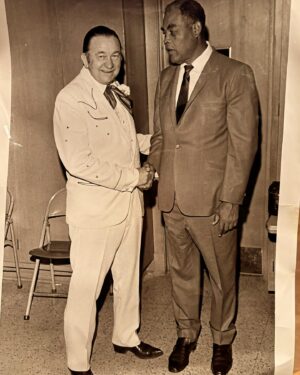 Amy Yasbeck Instagram - Just a picture of my father-in-law with the champ Joe Louis.🤯 circa 1972  Digging through some Ritter memorabilia boxes that have been tucked away for decades. #TexRitter #JoeLouis #vintage #boxing #countrymusic #johnritter
