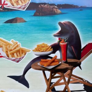 Ana Fabrega Instagram - Not a day goes by that I don’t think about this dolphin in a chair eating French fries and churros on the beach. I feel so lucky to have seen this in person.