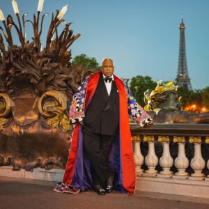 André Leon Talley Instagram - On the grand Pont Alexandre III in Paris, France, in Tom Ford court coat, Ralph Lauren black tie, Charvet shirt, 
Roger Vivier court shoes, photographed by Jonathan Becker, my favorite bridge in Paris.
Paperback writer:  Chiffon Trenches, my New York Times best-selling memoir goes on sale in paperback next week.  It has been a long, hard year but the memoir has bought me incredible joy and news. I was nominated for a Grammy award for audio sound, which was a first. To be nominated is already a win. And the most incredible
joy I sustain, is that I learned last Sunday, I am a Chevalier de l'ordre des arts et des lettres, of the French Republic.  This was the best day in my life, to be in the august and impeccable body of Chevaliers: Diana Vreeland, Tina Turner, James Baldwin, Rudolph Nureyev and for a black man educated in public schools in Durham, North Carolina, I thank my French teacher, the late Cynthia P. Smith, who wrapped me in French: the language, the culture, style, history and literature.  I also want to thank Wanda Garrett, my English teacher, who still resides in Durham, and who is a member of the Links Chapter of Durham, who had her own television show in Durham, early in the Sixties. She somehow knew that I was special.  Oh how I wish my mother, my father, William Carroll Talley, and my grandmother, all her nieces and nephews, all her siblings , and all my cousins who have gone on to glory were here. Photograph by Jonathan Becker #JonathanBecker #tomford #ralphlauren #abyssinianbaptistchurch #cfda #thechiffontrenches #hamishbowles #monoloblahnik #virgilabloh #marcjacobs