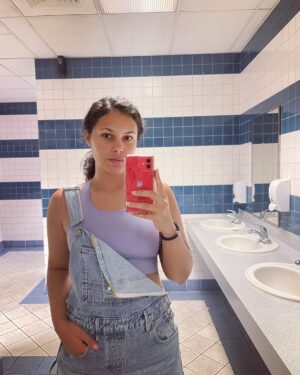Andrea Cortés Instagram - Movie theater bathroom mirror selfie with a filter cause I miss MySpace