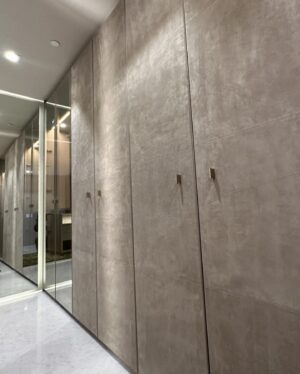 Andrés Mercado Instagram - This  Master (piece) Closet, delivered by the best @ornaremiami in suede, and gold mirrored doors, beautiful leather island, and more exquisite details when you swipe. Adding to this elegant space we have the wonderful @leebroom with his signature pendant light. This Master closet was fully  covered on a light green-goldish wallpaper, to continue this green conversation with the super comfy silky rug, as usual, @lafloreria.atelier adding elegance to the space next to this neutral white art pieces, and beautiful accessories thanks to @jonathanadler
