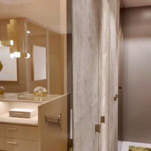 Andrés Mercado Instagram - This  Master (piece) Closet, delivered by the best @ornaremiami in suede, and gold mirrored doors, beautiful leather island, and more exquisite details when you swipe. Adding to this elegant space we have the wonderful @leebroom with his signature pendant light. This Master closet was fully  covered on a light green-goldish wallpaper, to continue this green conversation with the super comfy silky rug, as usual, @lafloreria.atelier adding elegance to the space next to this neutral white art pieces, and beautiful accessories thanks to @jonathanadler