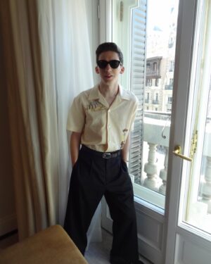 Andrew Barth Feldman Instagram - we have been traveling all over europe so you will see no hard feelings the movie. we are in spain now. will you please see no hard feelings the movie, it is a good movie
(📸: @jaymee333 
styling: @brianmeller 
shirt: @bode 
pants n shoes n belt: @hermes)