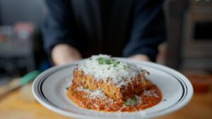 Andrew Rea Instagram - Behold: the 100 layer lasagna. This was a MONSTER and @alvin.zhou stepped up to the task. To see how it was done, link is in the tree!