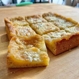 Andrew Rea Instagram - Gooey butter cake - flown back from St. Louis on my lap. Tastes as good as it sounds: a biscuity cake topped with a sort of butter custard. Swipe for saga   another STL legend @brian_lagerstrom, who was kind enough to moderate the final stop on my book tour! Full tippy toes with this guy