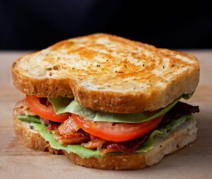 Andrew Rea Instagram - No-knead “everything bagel” bread, homemade mayo, extra crisp lettuce, thick cut bacon, and of course…tomatoes. BLT Basics is live now, link in tree!