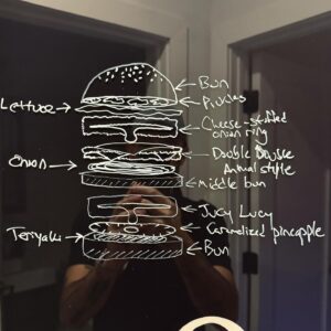 Andrew Rea Instagram - Binging is back baby!! To celebrate, I proudly present the Every Burger. Inspired by the brain-melded creation of Rick and Jerry in the new season of @rickandmorty, it’s 8 different styles of burgers in one: a dry-aged, Hawaiian, jucy lucy, bacon, Cuban frita, animal-style, good-morning burger on a potato-brioche bun. Live now, link in tree!