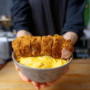 Andrew Rea Instagram - What’s better than a tonkatsu? A beeeeeeg beeeeeg big big big tonkatsu, like this one that Alvin made. Seriously look at this thing. Bet you want a bite, huh? We may have eaten it all but you can watch the process (always about the journey after all) link in bio
