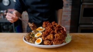 Andrew Rea Instagram - Behold: the 18 pound fried chicken bowl. Made with love by @alvin.zhou. We’ll take one for dinner to go 🥢 Link in bio & stories to watch