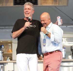 Andrew Zimmern Instagram - Bourdain Day 2024 is waning. I spent it purposefully, hosting an event raising awareness around mental health issues etc benefiting the @universityofminnesota neuro science dept with my pal @chefantonia …
Felt good. Love the pic of Tony making a dick joke at my expense during an event we did together at @sobewff long ago. And the other is me in the boots he bought me because he wanted me to have a little more cool in my wardrobe. #love is all that matters and the older I get the more I believe it to be ALL that matters