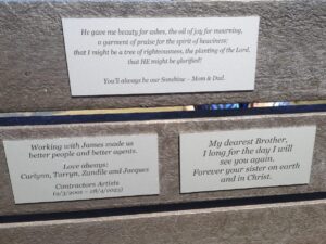 Anel Alexander Instagram - “In Loving Memory of ’The Prince of Gingers’, James Alexander, 8 Jan 1978 - 28 Apr 2023. By His Grace. For James, who loved this view, from Anel, who always sat beside him.”

On Sunday 28 April 2024 a bunch of family and friends went to the Drakensberg to scatter James’ ashes and put up a memorial bench for him. It felt surreal. One regularly sees those benches in parks and overlooking beautiful vistas. But it always belongs to somebody else. Some other ‘Beloved Grandpa’ or ‘Mother, daughter and friend, RIP’. But this time it was my bench...

My family has a home in the Central Drakensberg and James and I’ve been going there for the 22 years we were together. From our honeymoon in April 2003 to our very last ‘holiday’ 2 weeks before his terminal diagnosis end of January 2023.

We put up a bench for him in our favourite spot and planted a tree with his ashes. We had a really special memorial weekend with the friends and family. We laughed and cried, shared memories and photos and thanked God for his life. We decided to put a few different plaques on his bench as it was impossible to just sum him up in a few words. James would have liked it.

It was a beautiful, heartbreaking weekend and I was just reminded again about how we cannot do this alone. We need our family and friends. And also, we need to realize, that someday, it’s gonna be your bench. That’s just part of life. Try to live a life that will elicit people to write the kind of messages that James, despite all his tortured flaws, deserved on his bench. Our bench…