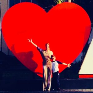 Angie Everhart Instagram - Sending huge #love #hugs #kisses #joy #goodhealth #happiness and #prosperity to the world today! #lovemyson #bestvacations #motherslove a huge heart from us Everhart’s! ❤️❤️❤️❤️❤️❤️❤️❤️❤️❤️❤️