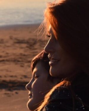 Angie Everhart Instagram - #love #loveyou #lovemyson #loveofmylife #beach #lookwherewelive 💜💋