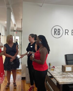Anita Corsini Instagram - Ahhhhhh! I’m so excited, we have officially launched our new co-op brokerage RB Realty and are moving all of our REDBaRN divisions under one roof along with our industry partners, McMichael and Gray, PC and Element Home Loans! Talk about full services for any home needs all in one pretty package in Downtown Woodstock. Stop by and see us! ❤️