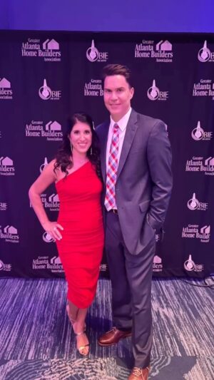 Anita Corsini Instagram - Oh what a ball we had hosting the 42nd annual OBIE awards for the @greater_atlanta_hba last night! It’s so fun to honor all the individual companies in the atlanta area who are killing it. It’s been a tricky market to navigate but these folks are the cream of the crop. I’ll be honest I was distracted all night looking at all the photos of their projects - holy moly so much talent out there. And this lovable co-host 😉 of mine is pretty fun to work with! 

So proud of @redbarnconstruction for bringing home a silver and gold award, what an incredible team of professionals we have the privilege of calling family. 

Always fun to have a night out to celebrate the hard work put into each project we do every day. My only request would be can we just wear jeans and boots because getting dressed up and having to wear sticky under stuff is not for the faint of heart … just sayin’ I think @sarablakely might be our next hero to solve this dilemma 🙃 IYKYK ❤️