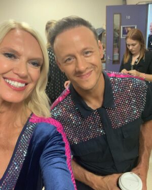 Anneka Rice Instagram - Around this  time 4 years ago I was about to arrive at #Strictly in a helicopter with a ton of hairspray and 5 inches of make-up…. to be winched into the studio in a jumpsuit, to do the ChaChaCha with Kevin Clifton. That was one hell of a Saturday night. With Dave Arch and his band singing “Anneka! You’re always on the run now” instead of Gloria! What a mind fuck! Good luck everyone tonight! #strictly #dancing #bbc1 @bbcstrictly