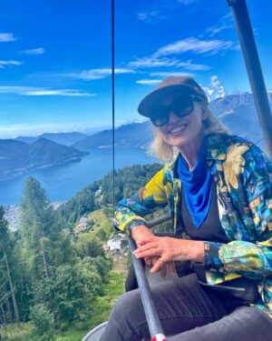 Anneka Rice Instagram - Yesterday I was on a chairlift in the Alps, heading to the top of a mountain. Today I seem to be on a chairlift on the Isle of Wight heading up The Needles.. With Josh Widdicombe! Blimey. The chairlift network is excellent. Caught the 06.30 from Lake Maggiore ….