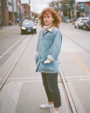 Annie Briggs Instagram - { m  u  m }
.
.
.
.
. thinking a lot about what it means to mother and be mothered. how we are cared by, and how we care for mothers. snapped a few years back by my pal @shaunmbenson wearing my mums jacket which holds a lot of mothering history.