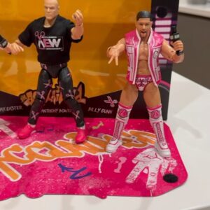 Anthony Bowens Instagram - When I was a kid, I use to pretend this Rocky Maivia @therock action figure (left) was me. It was the only figure that I thought looked like me. Now I don’t have to pretend anymore. 

THANK YOU to every single person who has purchased the brand new Acclaimed 3-pack and pre-ordered my first solo figure. Seeing people unboxing these is a dream come true. 🔫🔫✂️👆#AEW