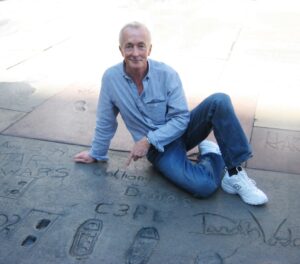 Anthony Daniels Instagram - @_maxi.taxi_ just tagged me on a pic of my footprints outside #graumanschinesetheatre on #hollywoodboulevard. 
Read about the day I put them there, and Rick Baker's involvement, on page 86 of the book. Christine took this photo in 2009 when we were in LA for Star Wars in Concert.
#starwarsinconcert #r2d2 #darthvader #c3po #iamc3po @dkbooks @starwars @therickbaker #rickbaker #newbalance