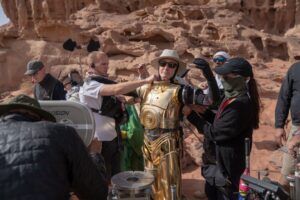 Anthony Daniels Instagram - My favourite film to act in was The Rise of Skywalker. I write about why that is on pages 234 – 249. The crew, the cast, the sets, the locations. And JJ.
Here I am being prepared to go on set in Jordan. Nearby, as always, is Orin Beaton, main boom operator for Episodes VII, VIII and IX. Photo by Jonathan Olley.
@olleyjonathan #theriseofskywalker #pasaana #c3po #iamc3po @dkbooks #boomoperator #wadirum @starwars #jjabrams