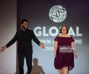 Anthony Hill Instagram - Had the privilege of sharing the runway with Sarah at the #BeBeautifulBeYourself Fashion Show for the Global Down Syndrome Foundation. And as you can see she wasn't playin games! All business on the catwalk!! 🔥🔥🤩‼️
Take a look at @globaldownsyndrome ..they're doing really important work. It was an honor to be a part of their big night. 🙏🏾💙💛

Also never put @genderless_gap_ad and me on a red carpet together 😆