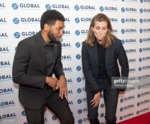 Anthony Hill Instagram - Had the privilege of sharing the runway with Sarah at the #BeBeautifulBeYourself Fashion Show for the Global Down Syndrome Foundation. And as you can see she wasn't playin games! All business on the catwalk!! 🔥🔥🤩‼️
Take a look at @globaldownsyndrome ..they're doing really important work. It was an honor to be a part of their big night. 🙏🏾💙💛

Also never put @genderless_gap_ad and me on a red carpet together 😆