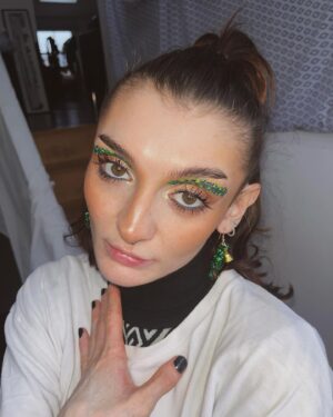 Anthony Lexa Instagram - LINK IN BIO❤️ i filmed a festive eyeliner tutorial and Q&A for my neglected Youtube channel. please go support the vid if you’re bored and fancy some long form trans gal content🥹🎄

(look was inspired by the talented @olivia__makeup  and my earrings from my boyfriend here)

#festivemakeup #graphicliner #trans