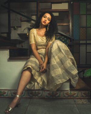 Apoorva Bhardwaj Instagram - Can you please find life on another planet and hold a seat for me there?
.
.
MUA: @beautifiedby_rakshajois 
Stylist: @stylebyshrujanaravikumar 
Photography: @8bitphotoguy 
Editing: @koushik.gowda_ @koushikgowdaphotography 
.
.
.
.
.
.
#actor #actress #skirt #indianwear #southindianactor #lipstick #redlips #lightplay #kfi #photoshoot #curlyhairdontcare #curlyhairactress #curlyhairmodel #curlsandcurves #monotone #poses #kannadaactress #telugufilmindustry #tamil #lighting #indiancurlyhair #curlyhair #curls #act #stairs #love #loveyourself #professionalphotographer #makeup #minimal