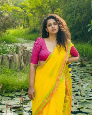 Apoorva Bhardwaj Instagram - Now what!? Are you walking back to me or back to me? 
.
.
Wearing @aneka.stories
Edited by @koushik.gowda_ 
.
.
#yellowsaree #curlyhairactress #sunkissed #apoorvabharadwaj