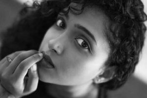 Apoorva Bhardwaj Instagram - Wondering what must be on your mind.
.
.
Photography and edit @koushik.gowda_ @koushikgowdaphotography 
MUA @glamupby_rakshajois 
.
.
.
.
#monochrome #portrait #curlyhairactress #eyes #kfi #apoorvabharadwaj