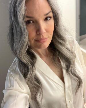 April Schutte Instagram - In the midst of the most stressful and scary weeks of our lives, I had a job that I had to work. I am grateful for the work and BEYOND grateful for my amazing agents @jasminenicoles.js and @ddparker for working miracles to work it out, however, it was extremely difficult to be “on” and focused on the task and hand. But I knew Shawn and Grey were both in good hands, so I just did it! These are the only photos I have from behind the scenes. Looks like jammies! I did my hair and makeup for the shoot. The treat was small yet very supportive and we even hugged at the end! 
.
.
.
#workingmodel #maturemodel #greyhairmodel #silverfox #silverhairmodel #bluesteel #highseas #costamesa